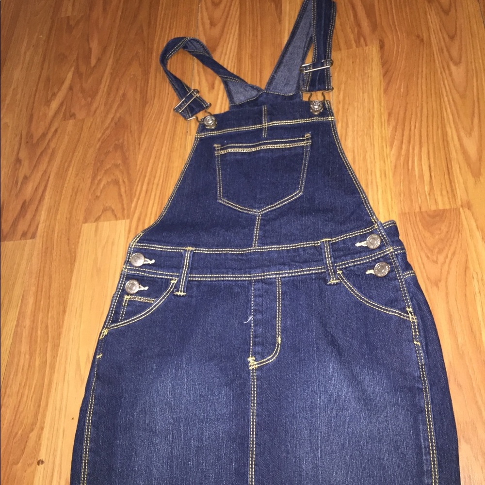 It’s a little girls overall dress